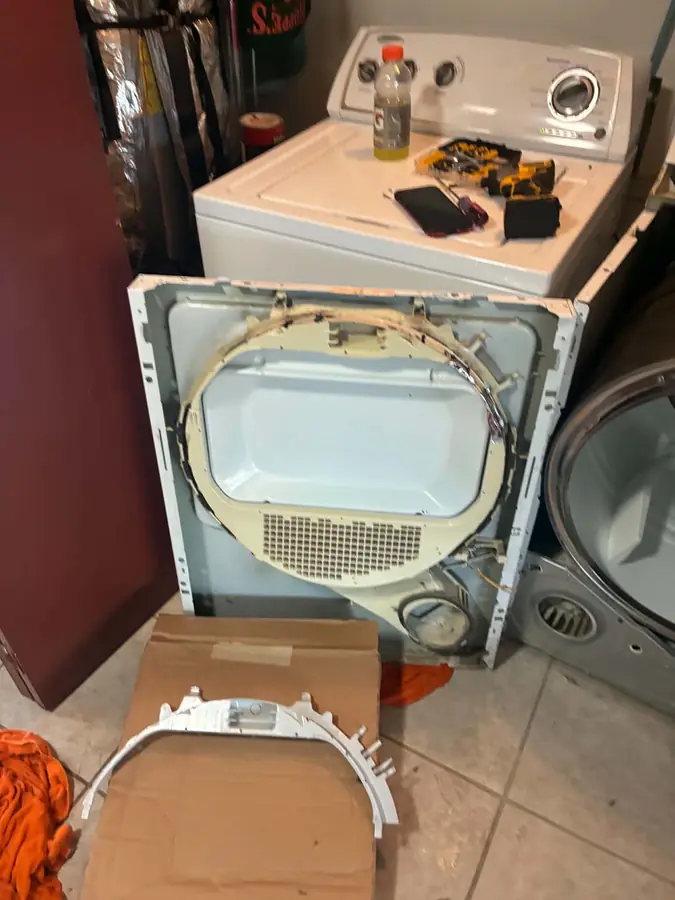 Dryer Front Bulkhead & Drum Seal Repair: We removed the front panel and bulkhead to replace a worn drum seal and glides