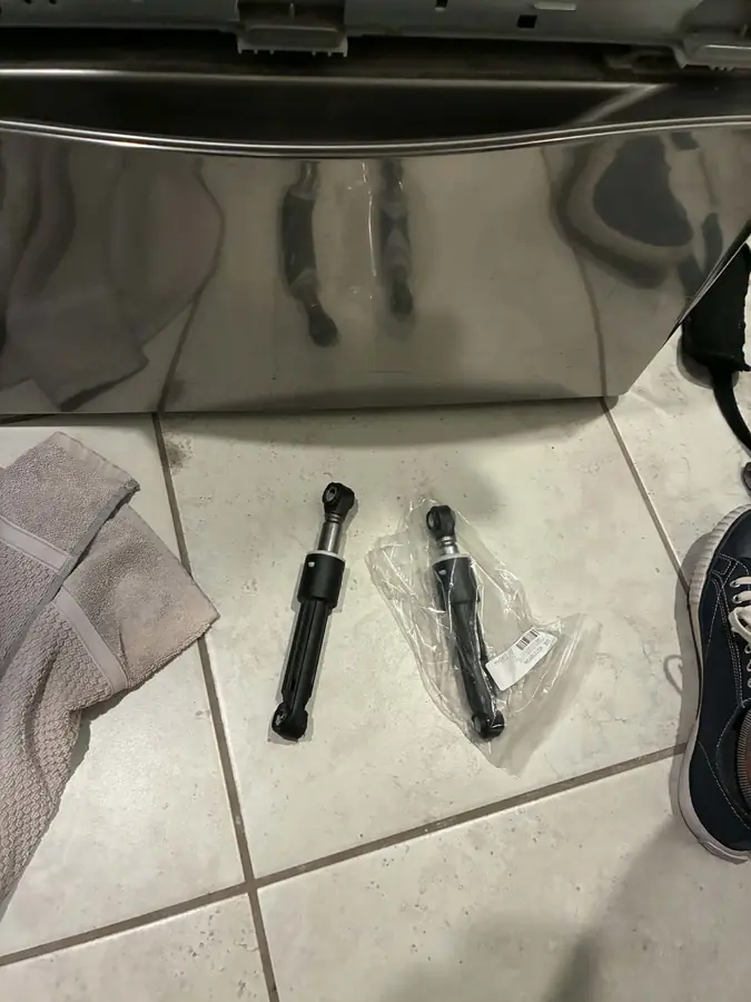 LG Washer Shock Absorber Replacement: The old and new shock absorbers side by side