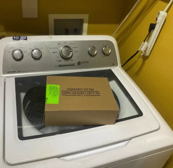 Maytag Bravos Washer: Factory-Certified Parts: A Maytag Bravos top-load washer with genuine Whirlpool Corporation factory-certified parts ready to install