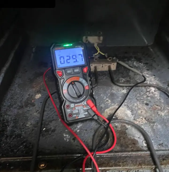 Oven Heating Element Resistance Test: A multimeter reading on the bake element terminals